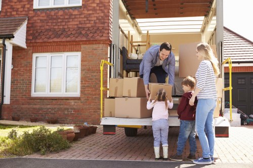 Moving van loaded outside a Mottingham home with clear pricing concept