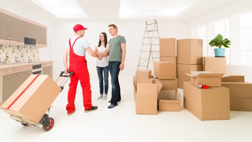 Workers following emergency and fire safety procedures during a move
