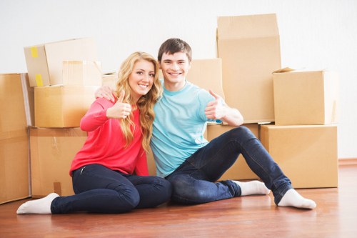 Unpacking household items into a new home in Mottingham