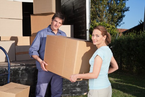 Loading furniture into a local removals van