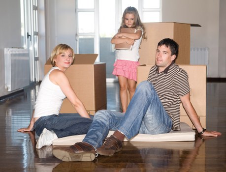 Local packing team preparing furniture and fragile items for transport